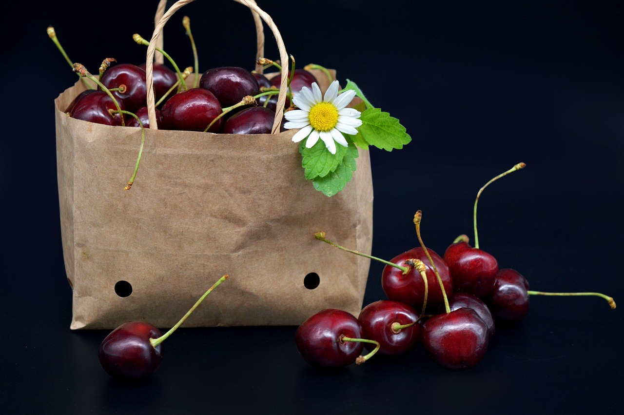 fruit, cherries, paper bag, healthy, fresh, daisy, food, vitamins, stone fruit, black background, recycled paper, eco-friendly packaging, sustainable packaging, ecological packaging