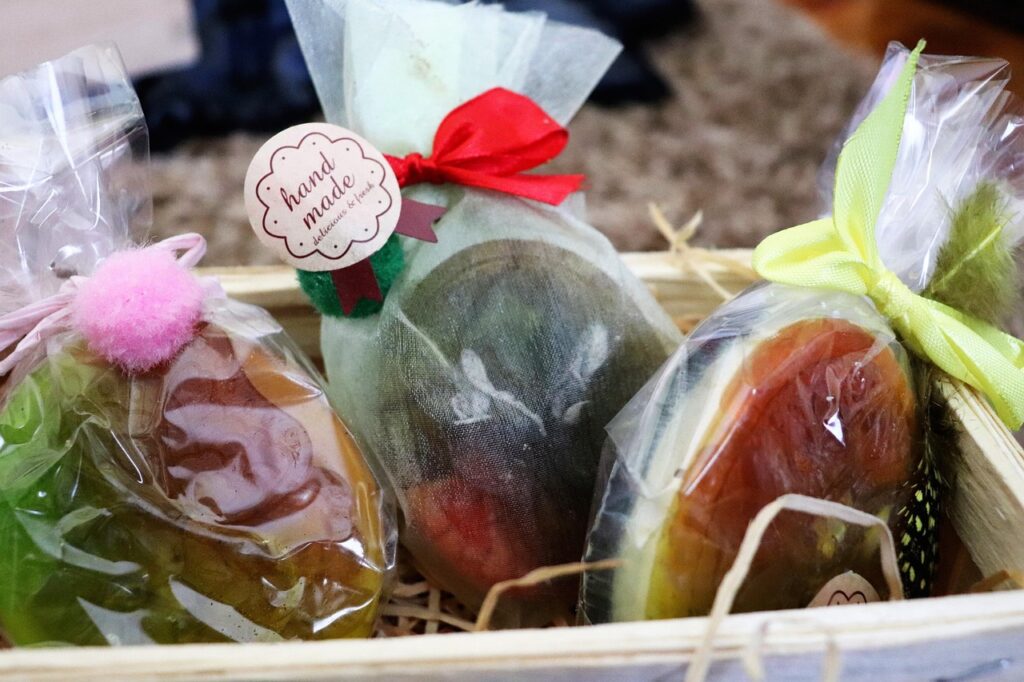 handmade gift, artisan soap, gift packaging, bath gift, handmade soap, craft soap, organic soap, gift wrap, gift idea, festive gift, rustic packaging, soap bar, natural cosmetics, eco friendly, mesh bag, colorful bow, handmade tag, gift crate, creative wrap, soap decoration, natural skincare, beauty product, handmade present, aesthetic packaging, pampering gift