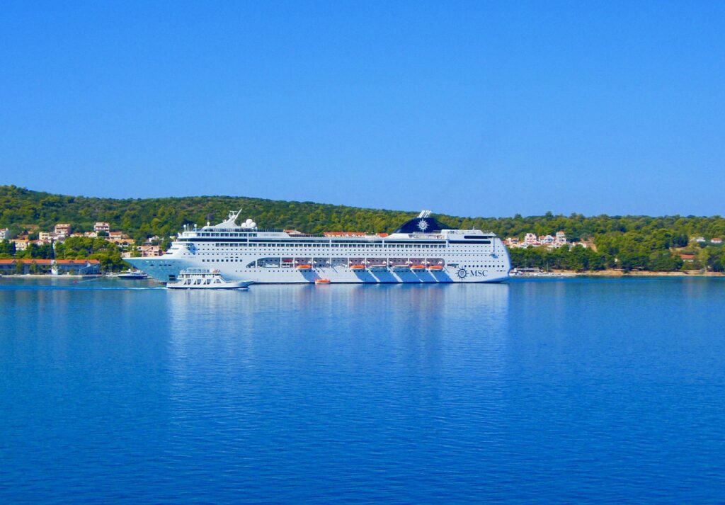 cruising at greek islands, greek islands, blue water, msc, mediterranean shipping company, kefalonia, coastline, greek summer, turquoise, touristic, destination, island, sea, shore, cruise liner, cruising, island hopping, large ship, cruise liner at greek island, boat, nature, calm, greek landscape